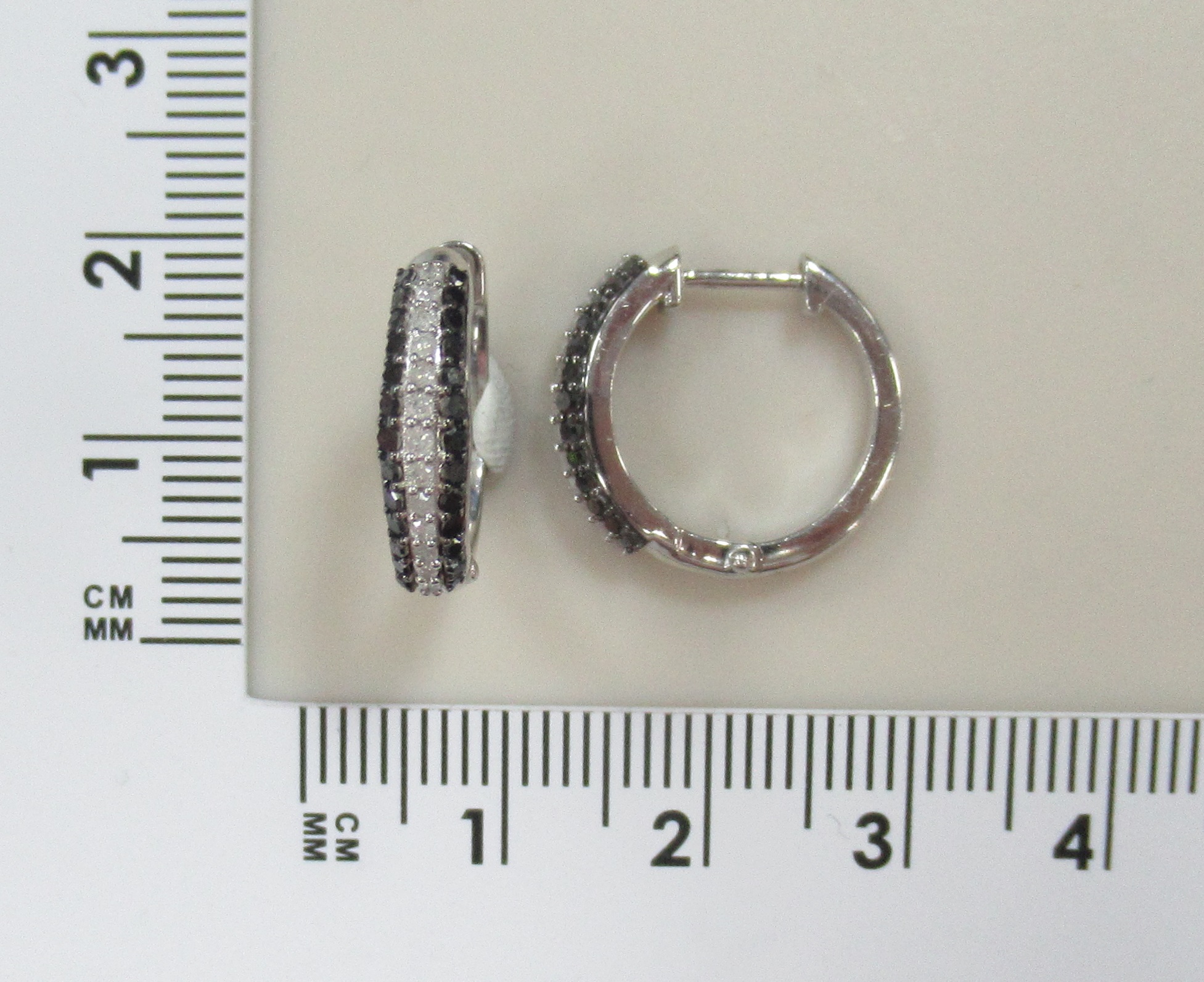 Серебряные серьги-конго с бриллиантами